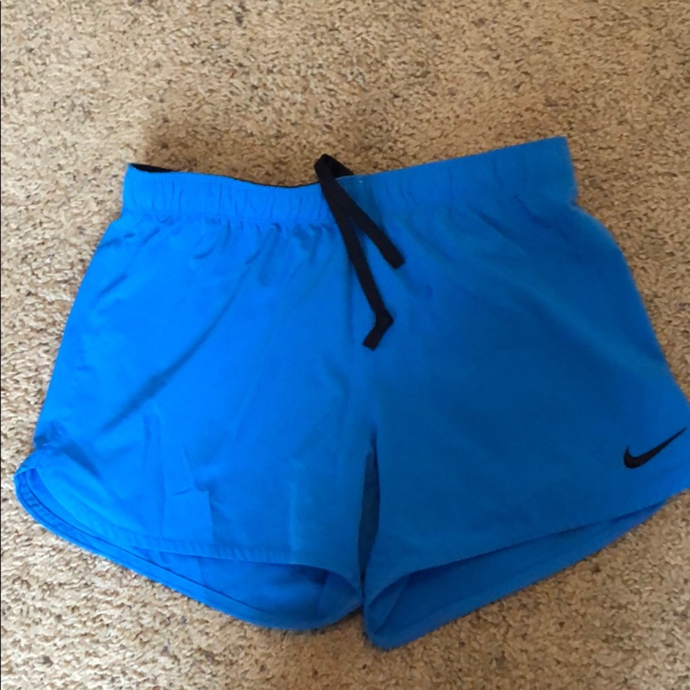 Blue nike running shorts